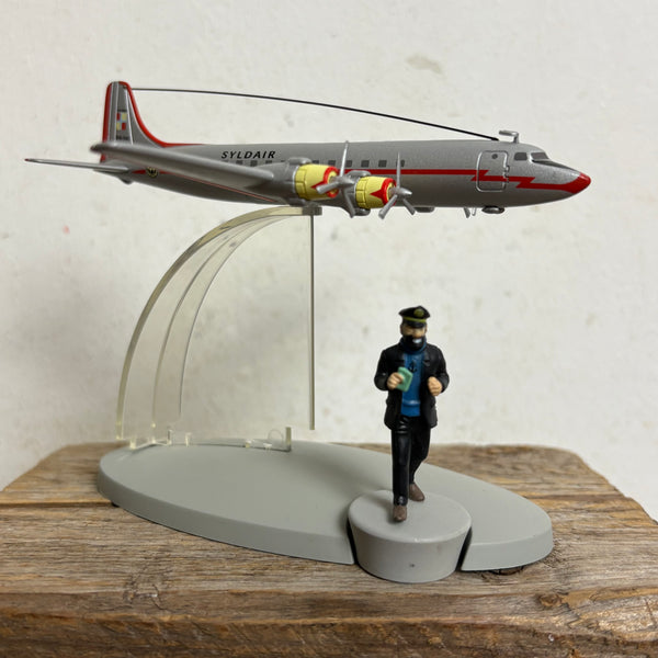 Modell Figur und Buch Tim und Struppi das Syldavisches Flugzeug mit Kapitän Haddock
aus Ziel Mond