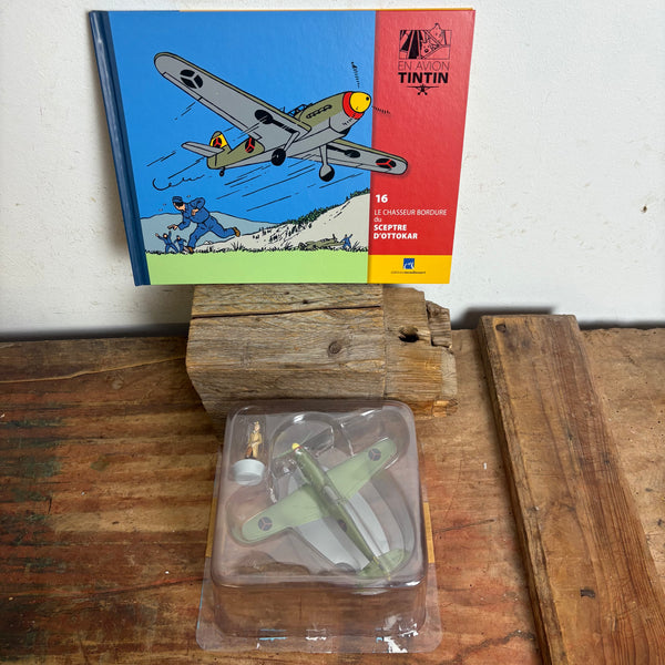 Modell Figur und Buch Tim und Struppi Das bordurische Jagdflugzeug mit Tim aus König Ottokars Zepter