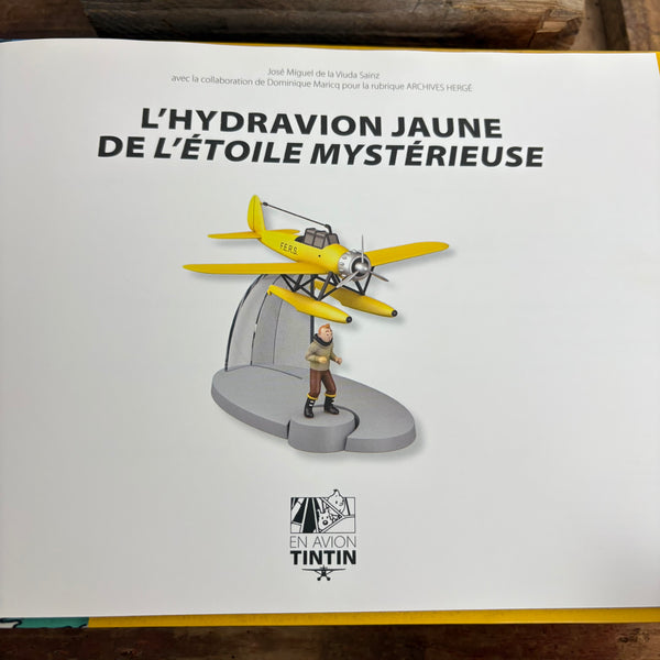 Modell Figur und Buch Tim und Struppi Das Gelbe Wasserflugzeug mit Tim aus Der geheimnisvolle Stern