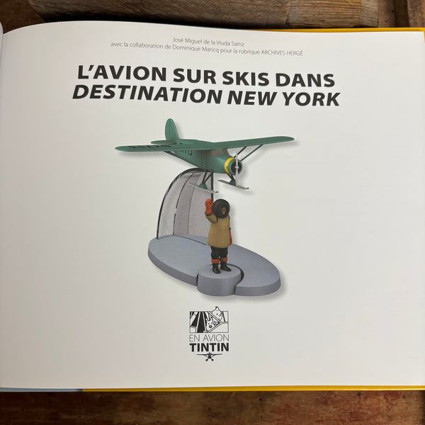 Modell Figur und Buch Tim und Struppi das Flugzeug auf Skiern mit Professor Nielsen aus Ziel New York