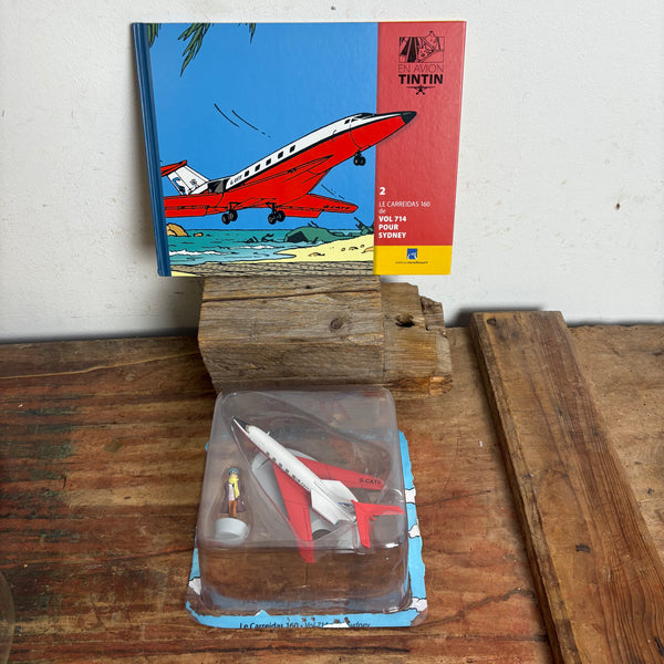 Modell Figur und Buch Tim und Struppi Das Geschäftsreiseflugzeug Carreidas 160 mit László Carreidas aus Flug 714 nach Sydney