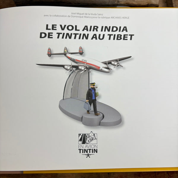 Modell Figur und Buch Tim und Struppi Das Flugzeug der Air India mit Kapitän Haddock aus Tim im Tibet