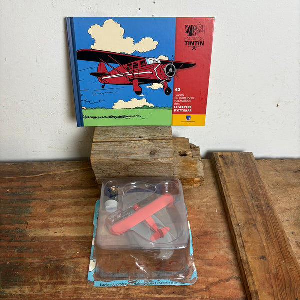 Modell Figur und Buch Tim und Struppi Das rote Doppeldecker Flugzeug von Professor Halambic mit Pilot aus König Ottokars Zepter