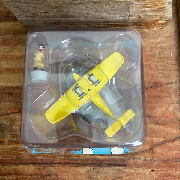 Modell Figur und Buch Tim und Struppi das gelbe Flugboot der Luftpost mit Alonzo Perez aus Die zerbrochene Ohrmuschel