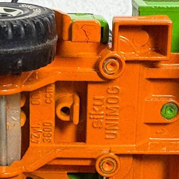 Modell Mercedes Benz Unimog U406 Nr. 1620 und Anhänger Nr. 2215 von Siku