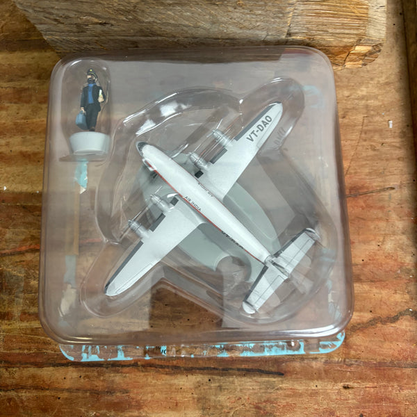 Modell Figur und Buch Tim und Struppi Das Flugzeug der Air India mit Kapitän Haddock aus Tim im Tibet