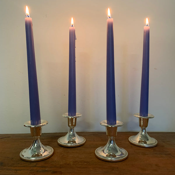 4 versilberte Kerzenständer