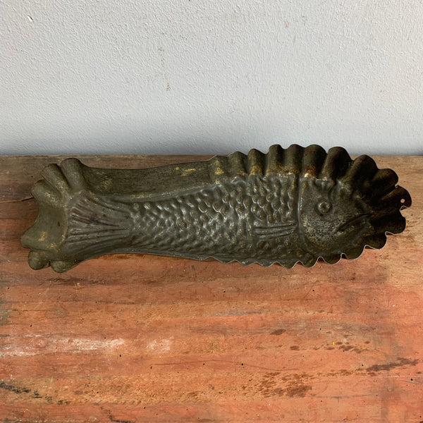 Antike Backform Fisch