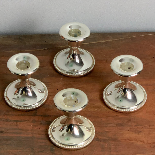 4 versilberte Kerzenständer
