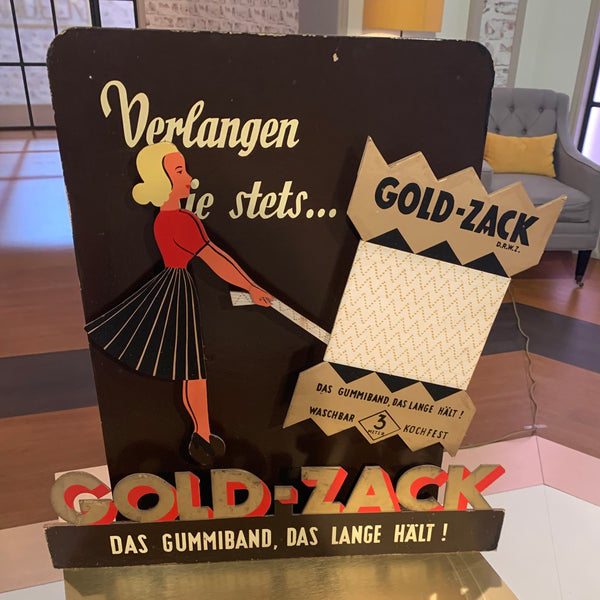 Werbeaufsteller der Marke Gold-Zack