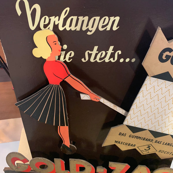 Werbeaufsteller der Marke Gold-Zack