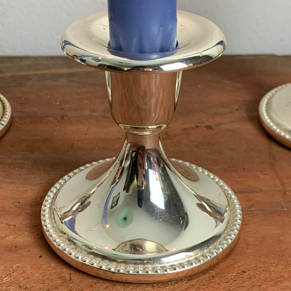 4 versilberte Kerzenständer